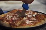 Matériel de pizzeria, spatules, roues, palettes et plateaux